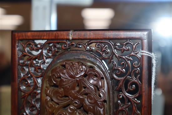 A Chinese green and russet jade mounted wood model of a table screen, early 20th century Height 19cm